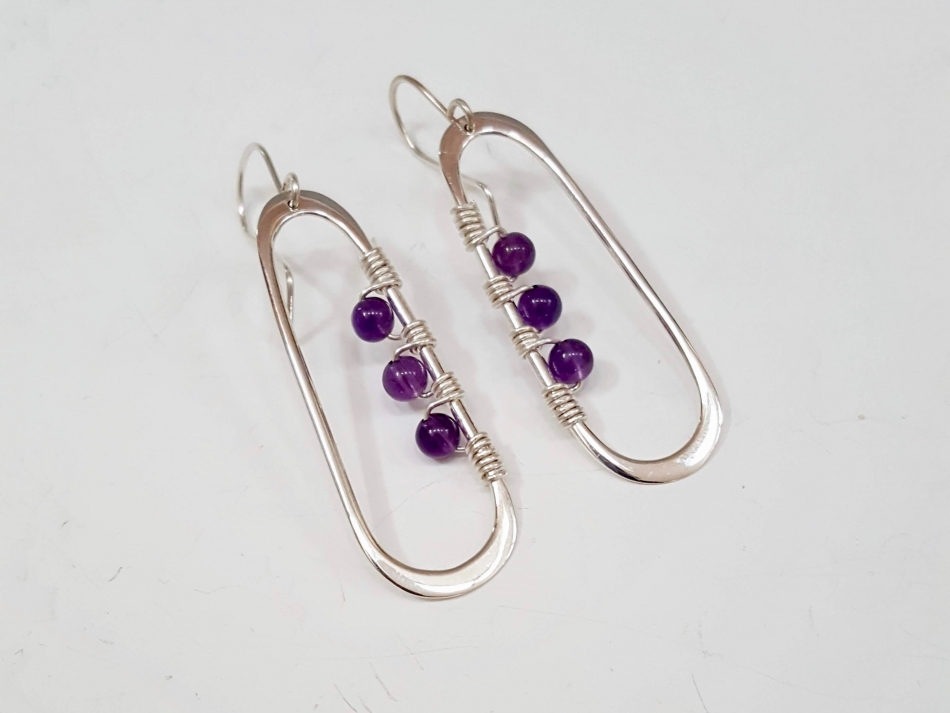 Oval earrings with amethysts website.jpeg